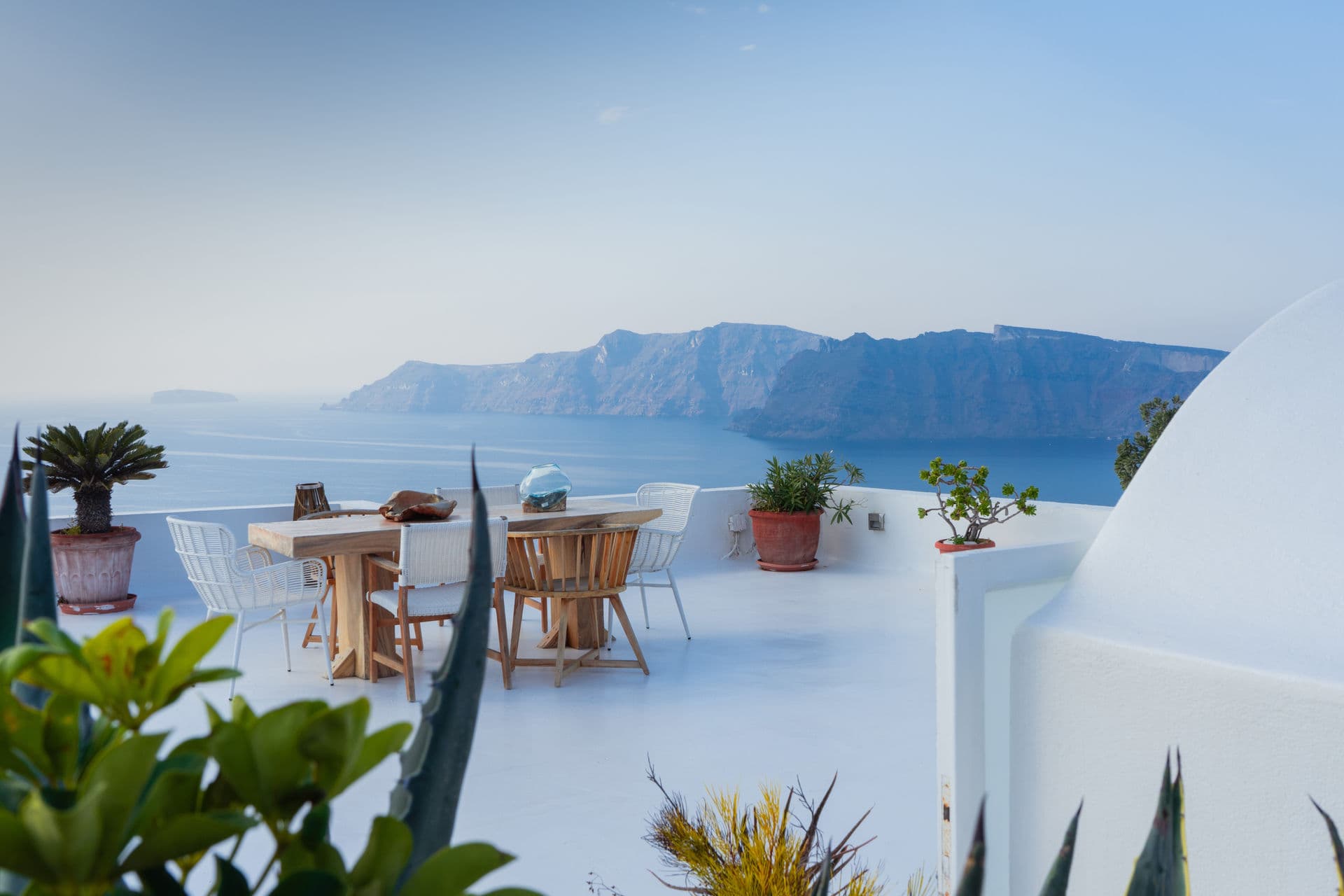 Santorini whitewashed terrace overlooking the Mediterranean Sea